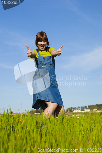 Image of Happy woman on nature