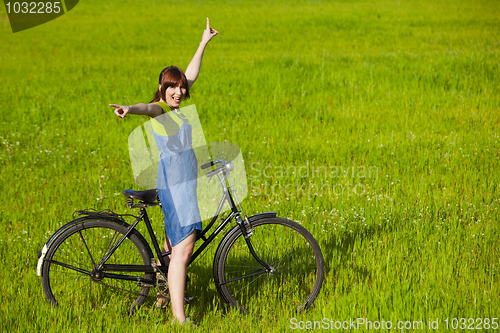 Image of Girl with a bicycle