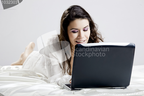 Image of Working on the bed