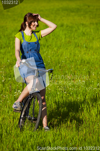 Image of Girl with a bicycle