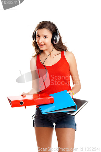 Image of Young girl listen music