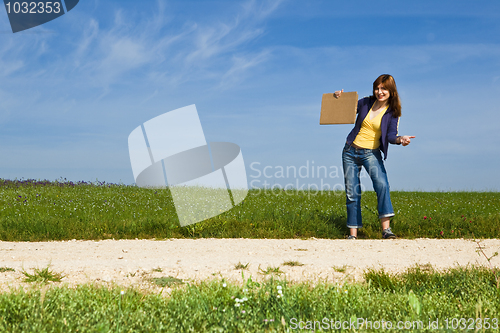 Image of Hitch hiking girl