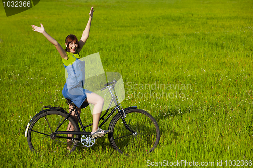 Image of Girl with a bicycle