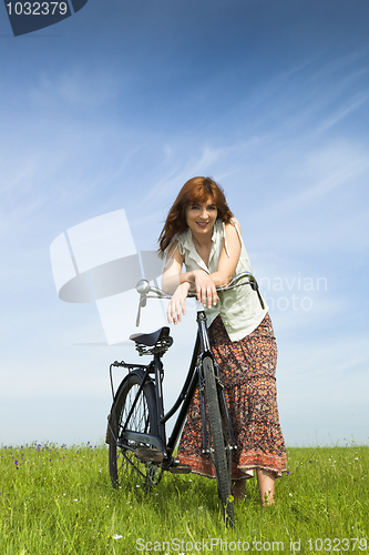 Image of Girl with a bicycle