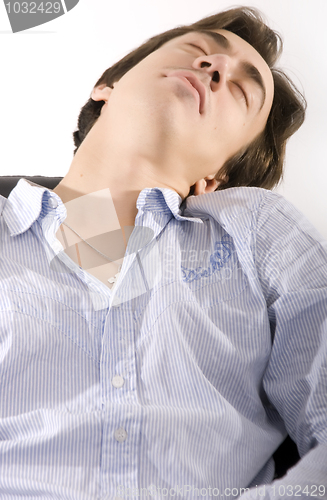 Image of Man sleeping in the arm-chair