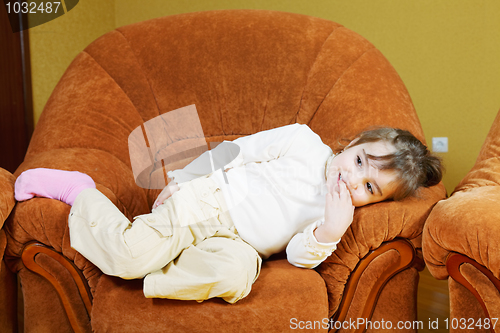 Image of Girl relaxed in chair