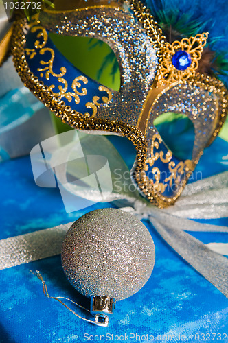Image of  New Year's and Christmas ornaments and a carnival a mask