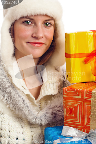 Image of Portrait of the young woman with New Year's gifts, it is isolate