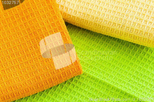 Image of  Multi-coloured towels, close up a background 