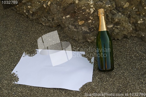 Image of Blank postcard and champagne bottle