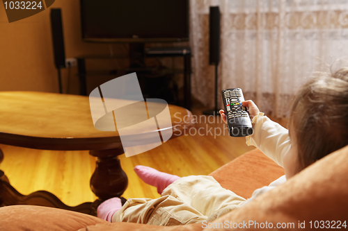 Image of Child with remote control