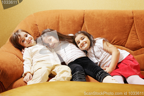 Image of Three girls on sofa