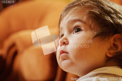 Image of Cute little girl looking up