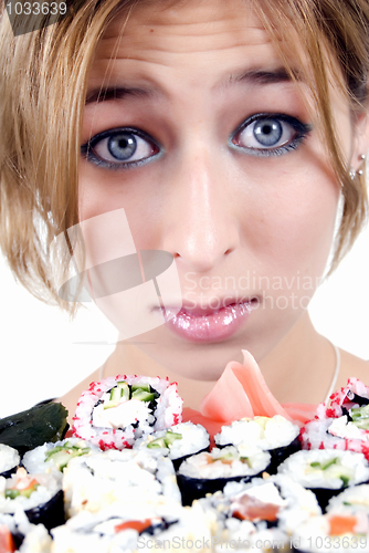 Image of  young girl  with sushi