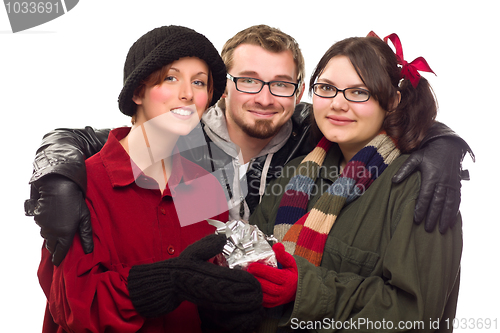 Image of Three Friends Holding A Holiday Gift Isolated