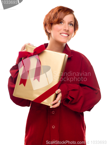 Image of Pretty Red Haired Girl with Wrapped Gift Isolated