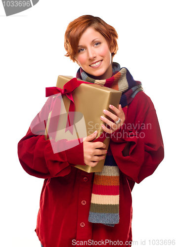 Image of Pretty Red Haired Girl with Scarf Holding Wrapped Gift