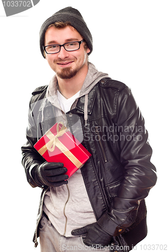 Image of Warmly Dressed Handsome Young Adult Holding Gift