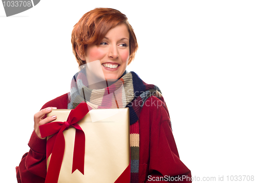 Image of Pretty Girl with Gift Looking to the Side Isolated