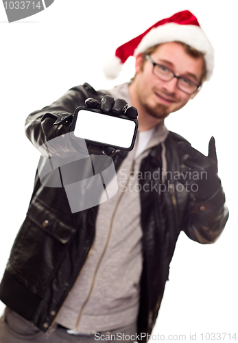 Image of Man with Santa Hat Holding Out Blank Cell Phone