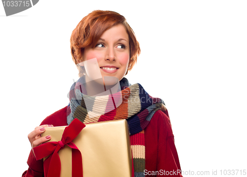 Image of Pretty Girl with Gift Looking to the Side Isolated