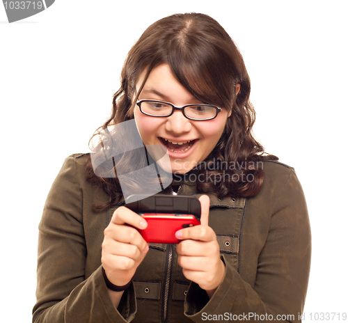 Image of Excited Young Caucasian Woman Texting on Her Mobile Phone