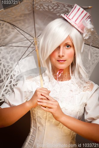 Image of Pretty White Haired Woman with Parasol and Classic Dress