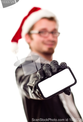 Image of Man with Santa Hat Holding Out Blank Cell Phone