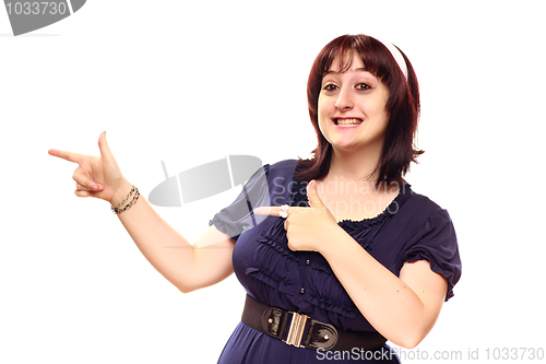 Image of Happy Young Caucasian Woman Pointing to the Side on White