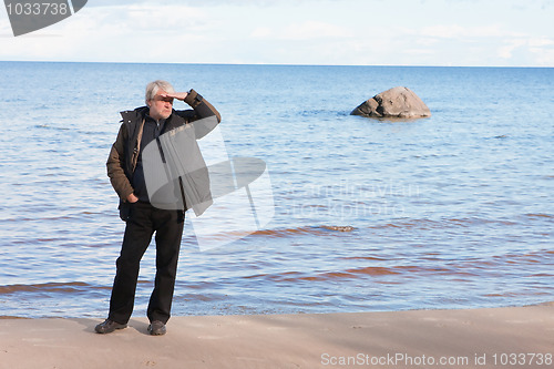 Image of Middle-aged man at the sea.