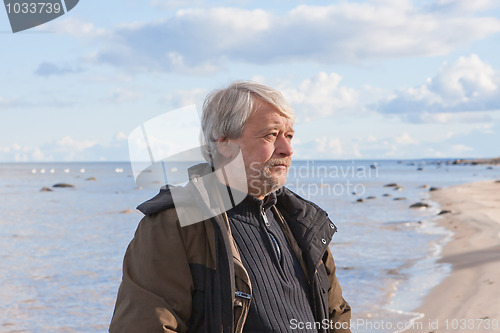 Image of Middle-aged man at the sea.