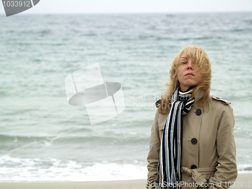 Image of Woman on sea shore