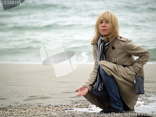 Image of Woman on sea shore