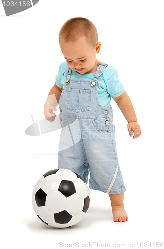 Image of Little boy with football ball