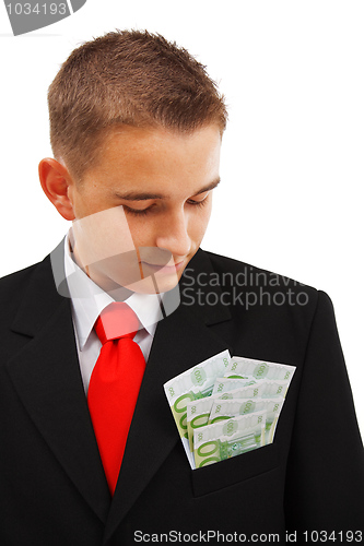 Image of Man looking at money