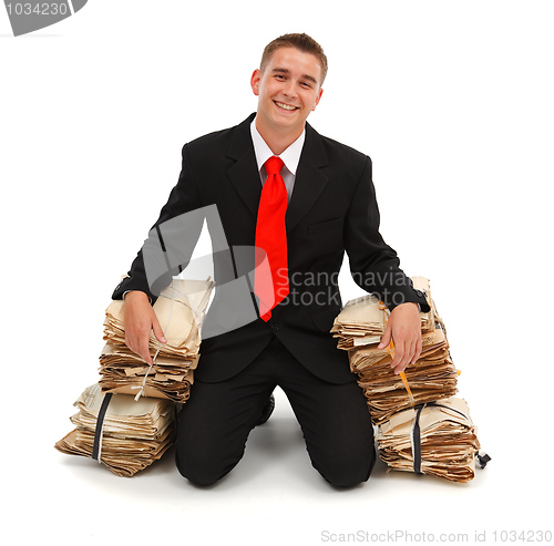 Image of Happy man with paperwork