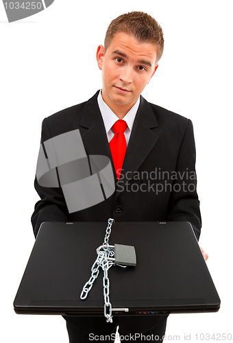 Image of Man holding a locked computer