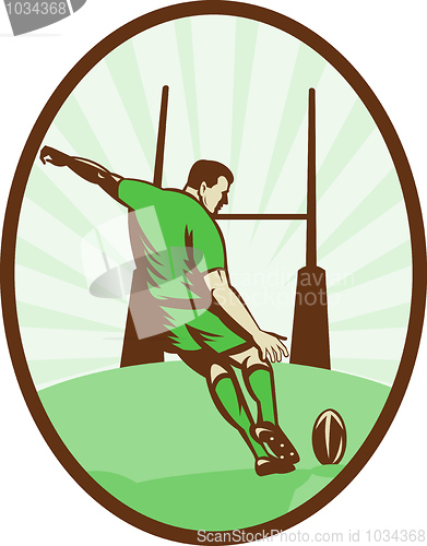 Image of Rugby player kicking ball