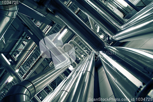 Image of Industrial zone, Steel pipelines in blue tones  