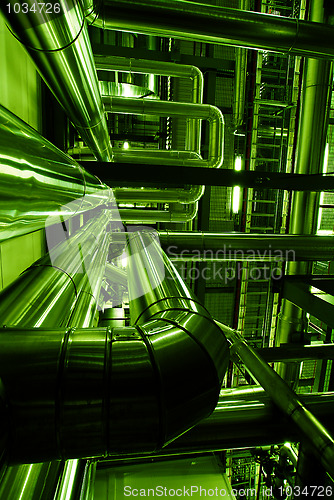 Image of Industrial zone, Steel pipelines in green tones  