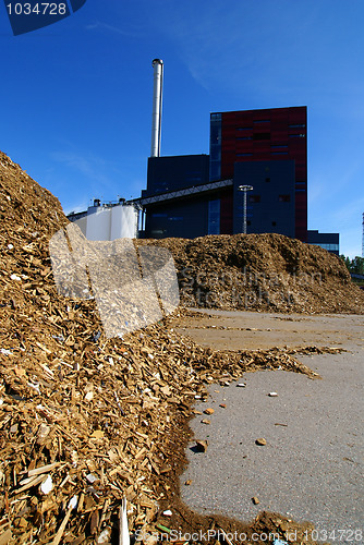 Image of bio power plant with storage of wooden fuel 
