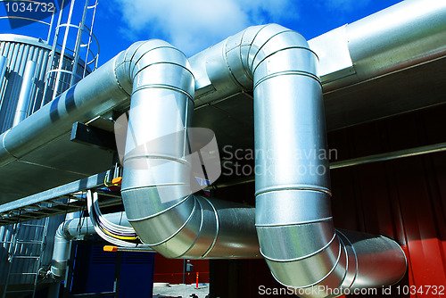 Image of Industrial zone, Steel pipelines in blue tones  