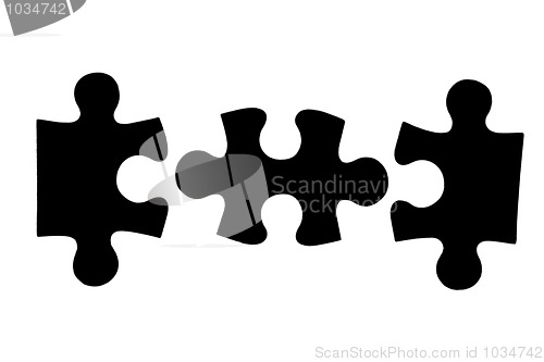 Image of three different black puzzle pieces