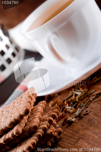 Image of cup of herbal tea and some fresh cookies