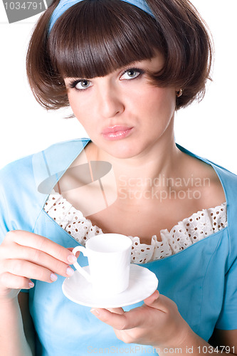 Image of woman enjoying a cup of coffee 