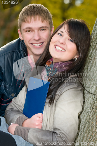 Image of Portrait of cheerful students outdoors