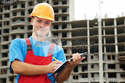 Image of Builder satisfied inspector at construction area