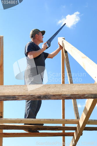 Image of builder at roofing works