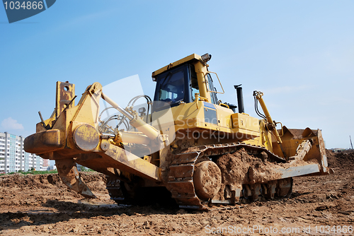 Image of heavy bulldozer with ripper