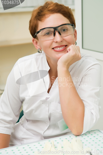 Image of happy woman dentist